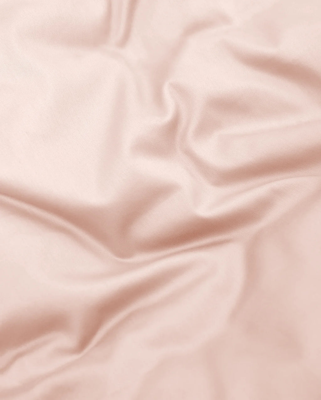 Närbild på rosa bomullssatin i Bäddset Blank Rosa